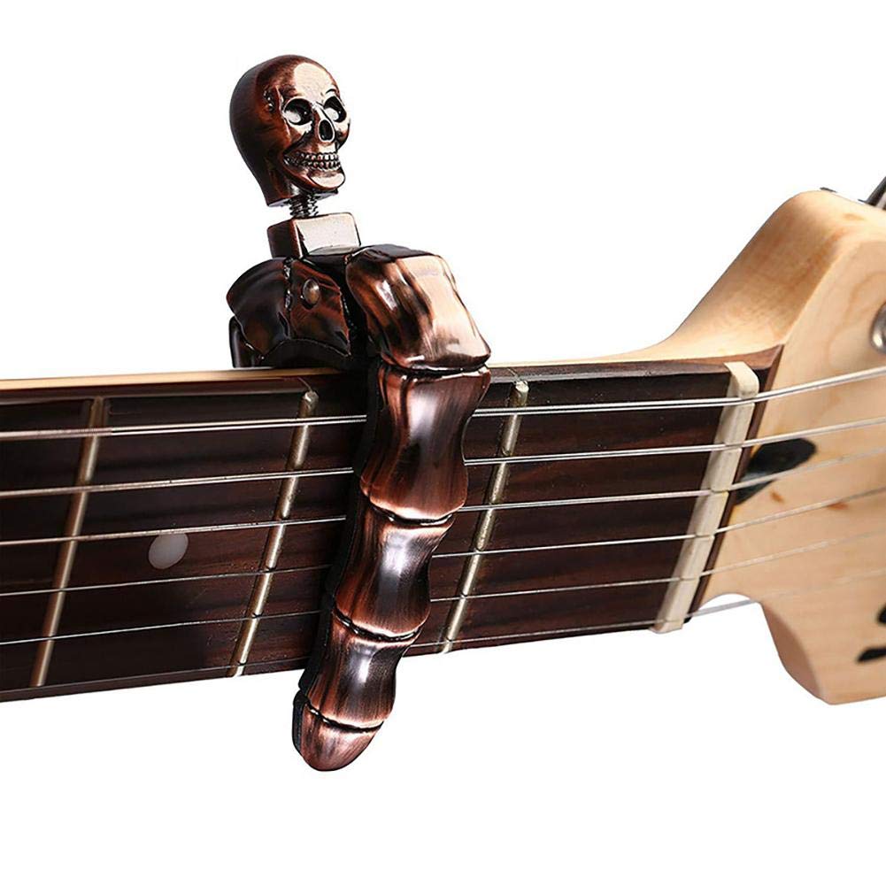 Capo Gitar Bentuk Tengkorak un - Musical Instrument Organ ulasan dan harga
